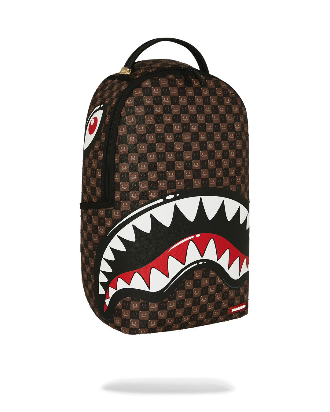 Brown printed backpack with shark-mouth graphic and small red side patch