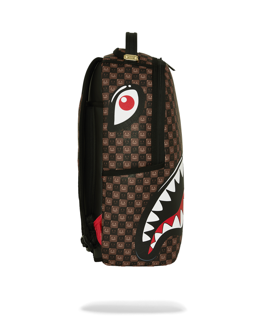 Brown patterned backpack side view with shark-mouth panel and black interior panel