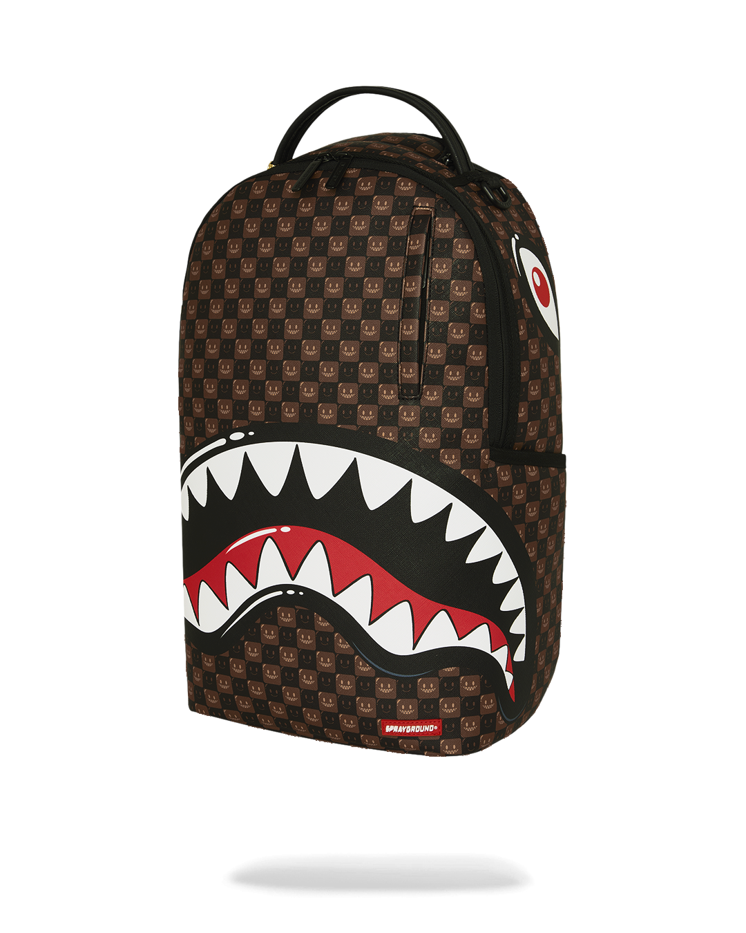 Brown patterned backpack front view with shark-mouth graphic and top handle