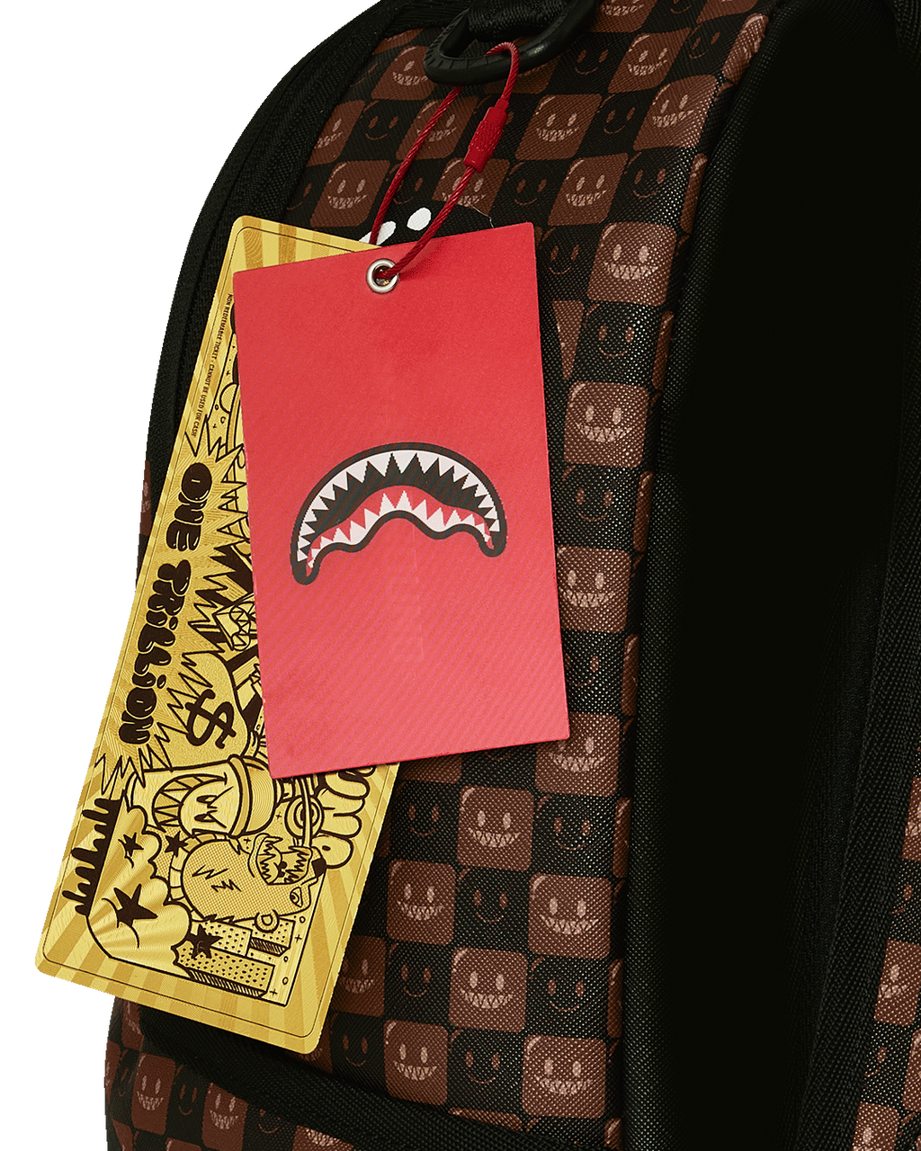 Backpack bag with hanging tags on brown checker fabric with shark pattern