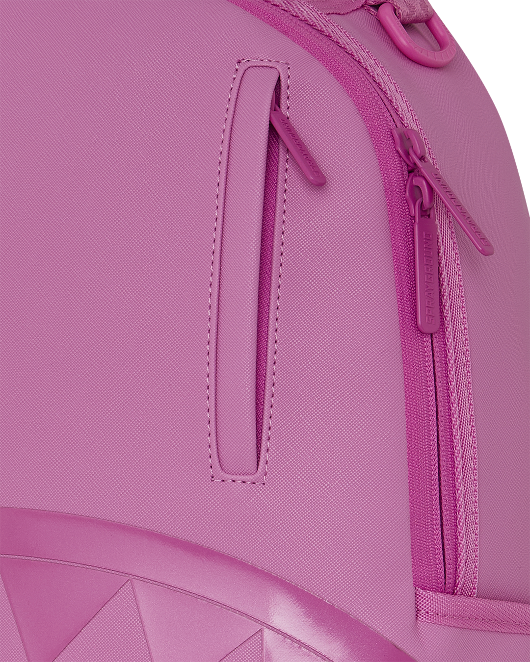 Pink backpack bag with front zipper pocket and stitched handle strap