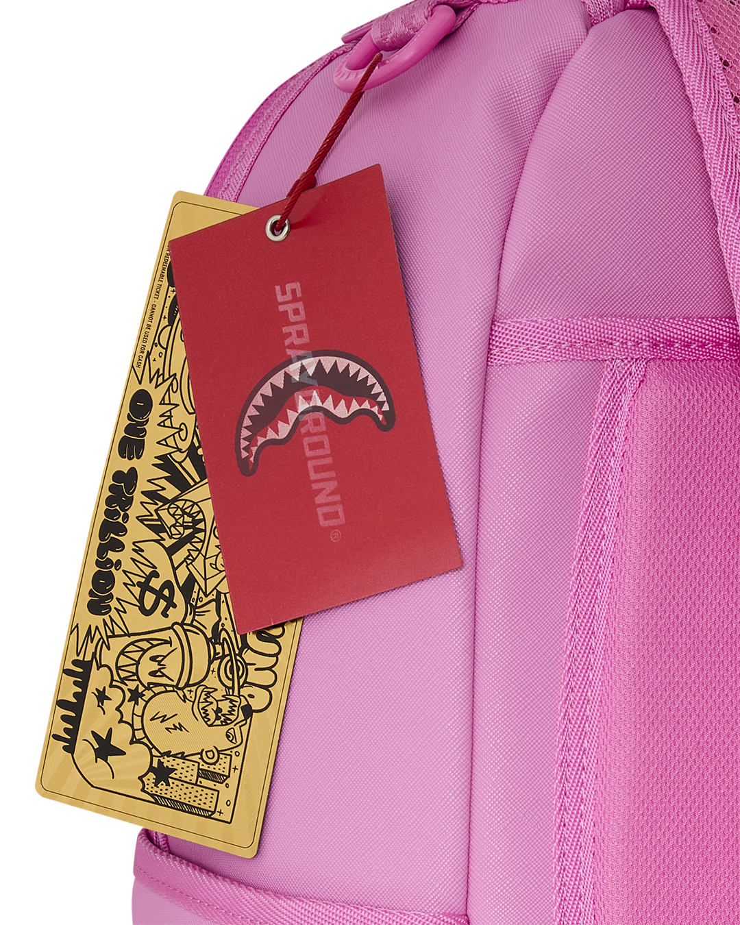 Pink backpack bag with hanging product tags and mesh-pattern front panel