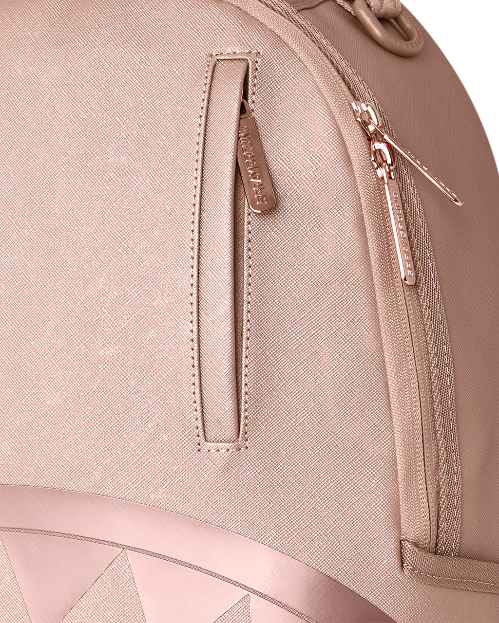 Rose Sprayground backpack close-up of side zipper and stitched panel