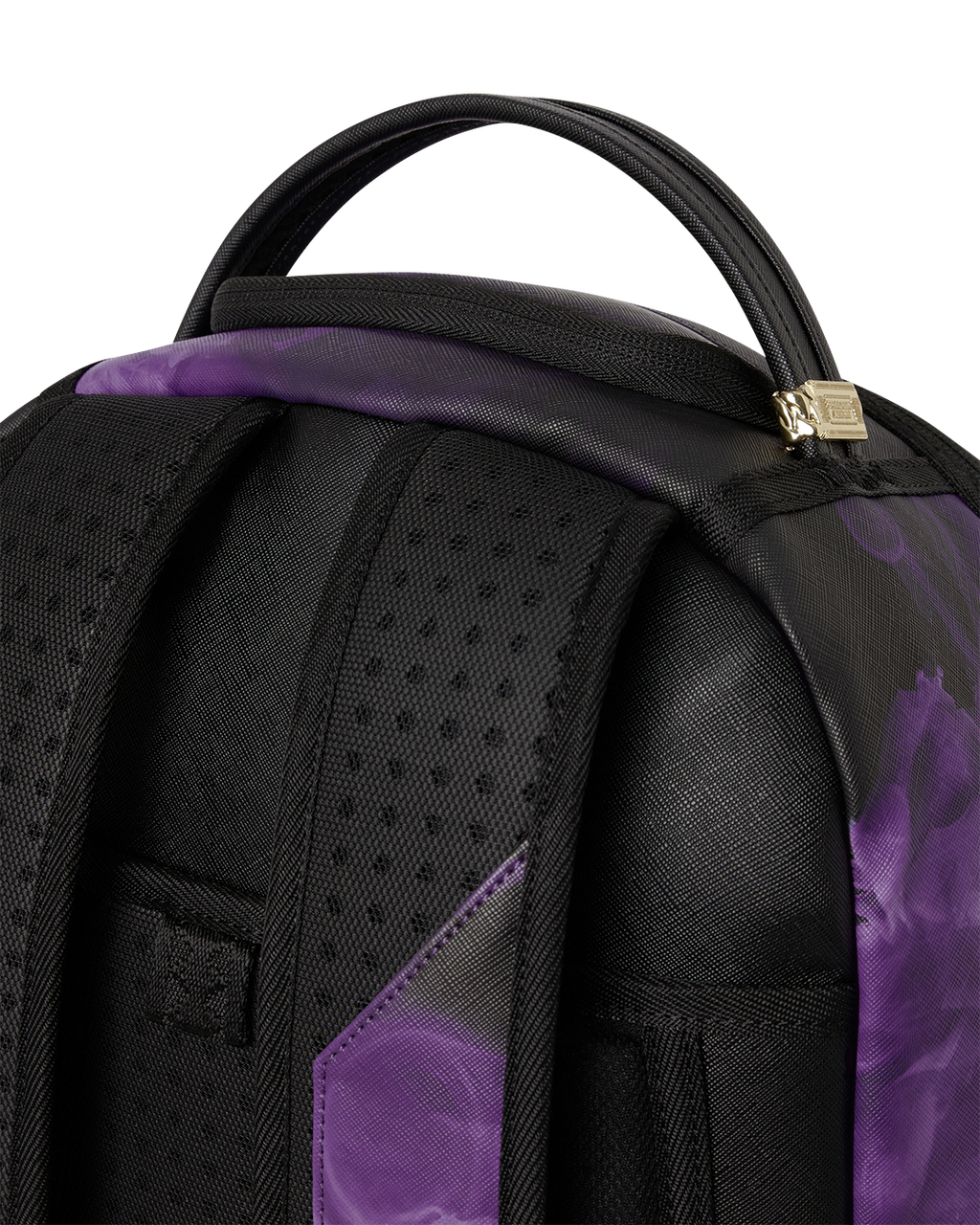 Purple-and-black backpack bag close-up of textured front panel and strap area