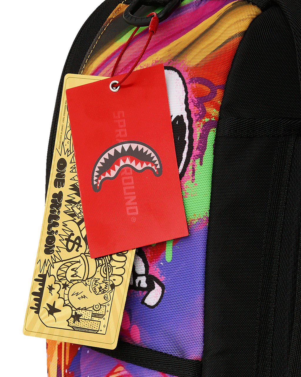 Peanuts Snoopy backpack with hanging product tags on multicolor fabric panel
