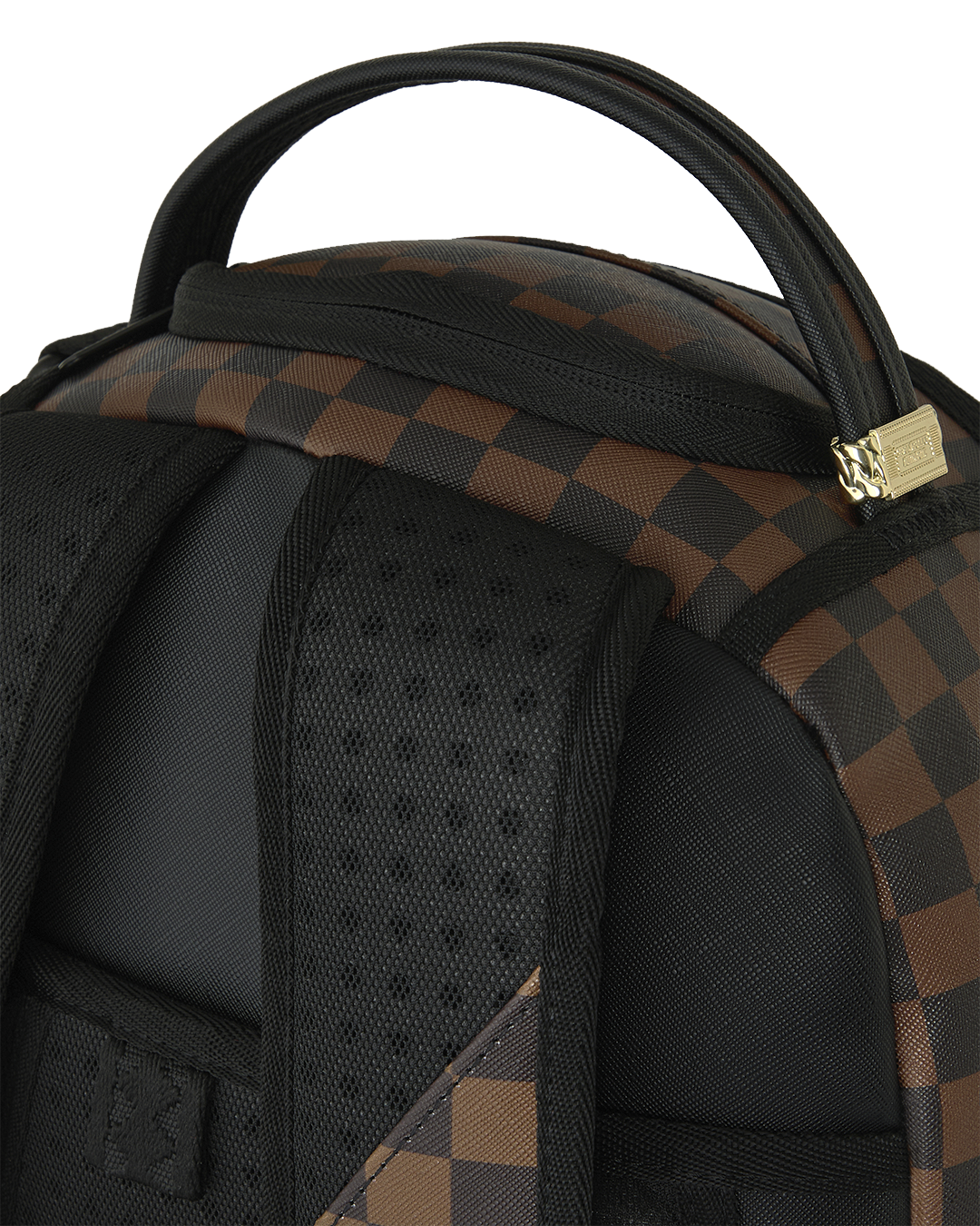 Brown check backpack with black padded top and adjustable shoulder strap