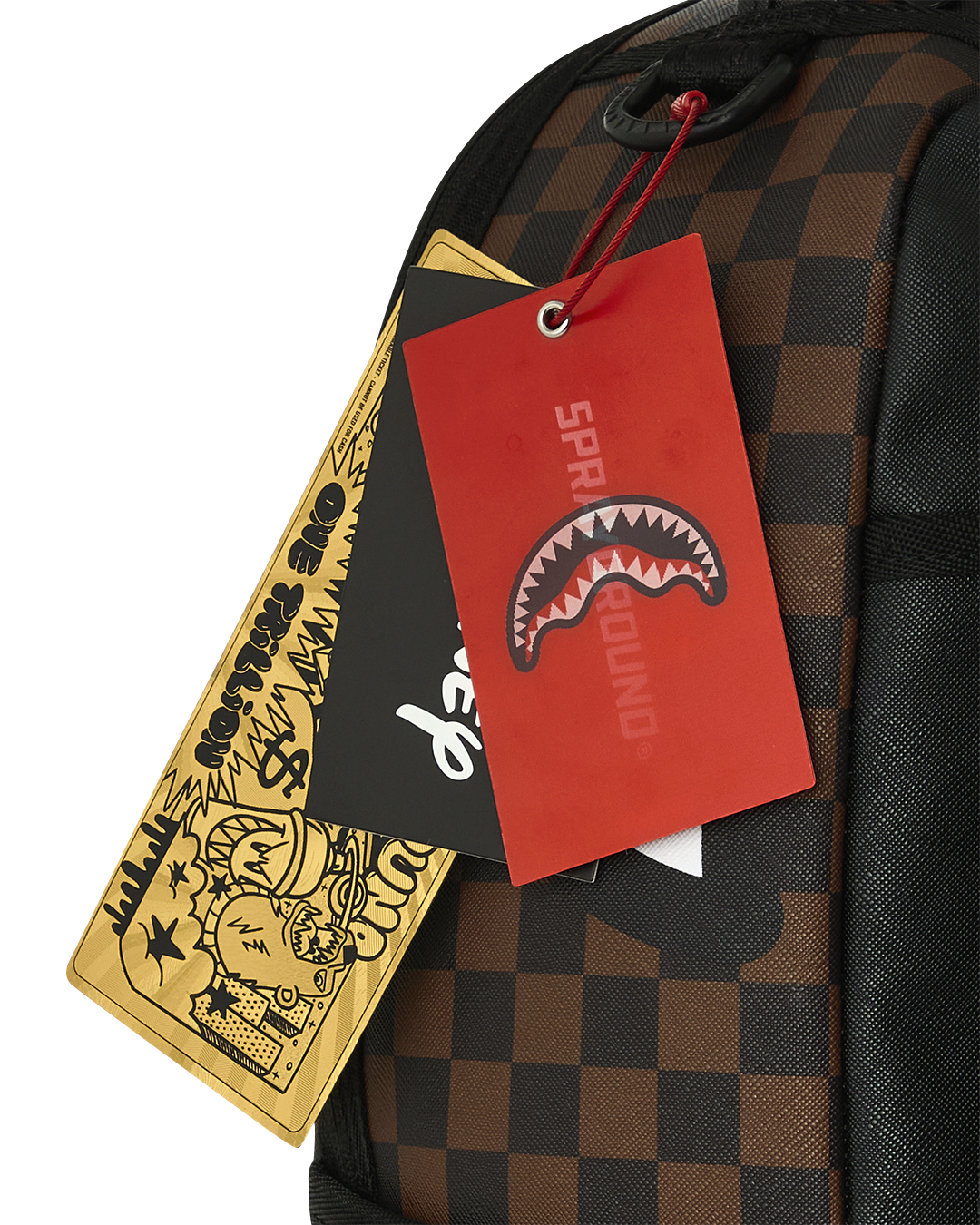 Brown check backpack with hanging red and gold product tags and black side