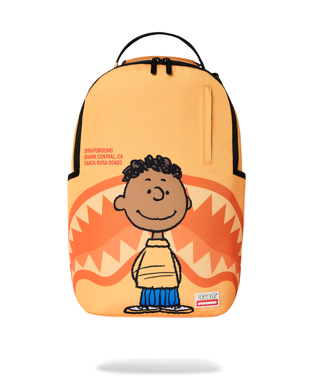 Sprayground Peanuts Franklin backpack, orange with illustrated peanuts character front