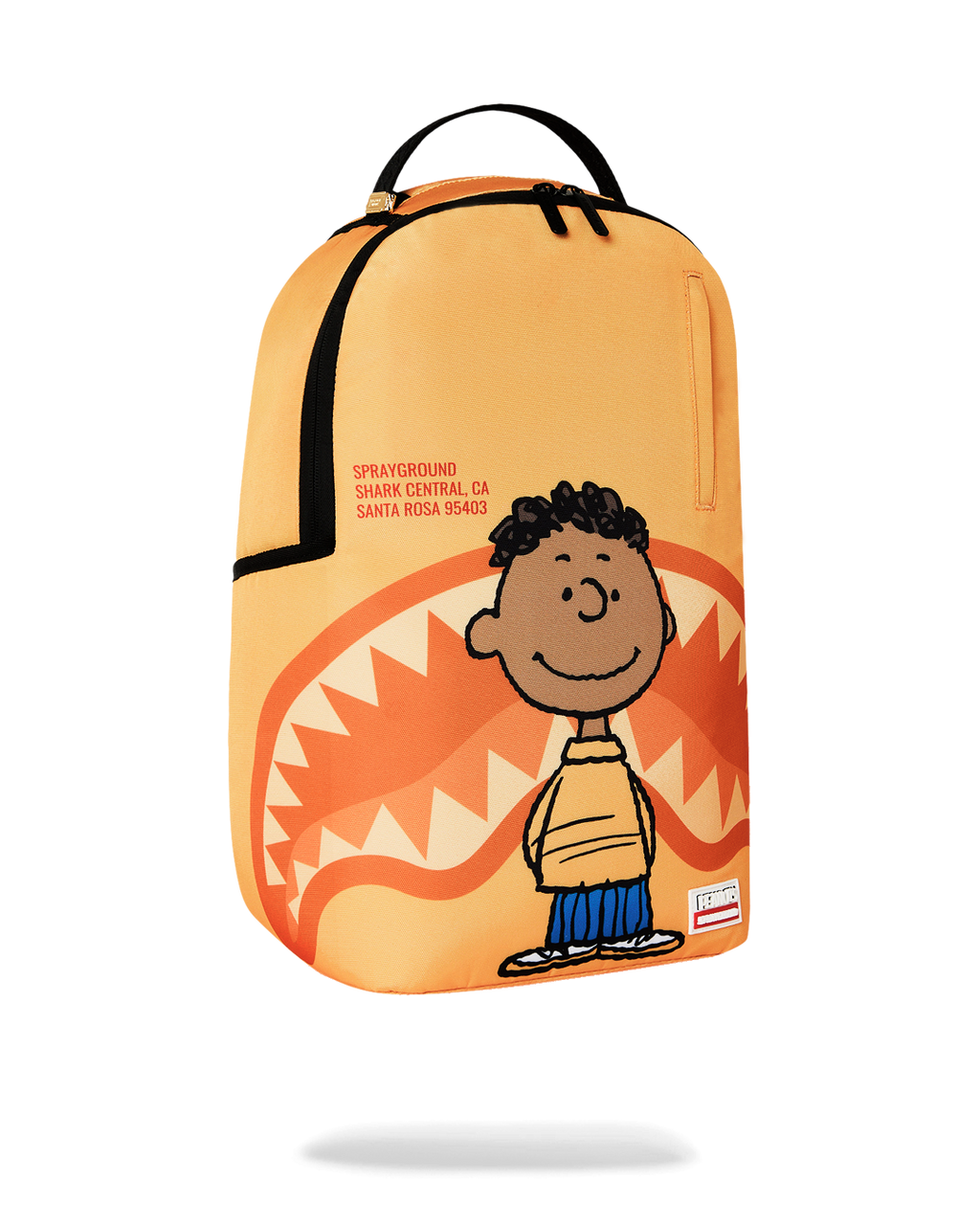 Sprayground Peanuts Franklin backpack, orange front panel with character graphic and zip