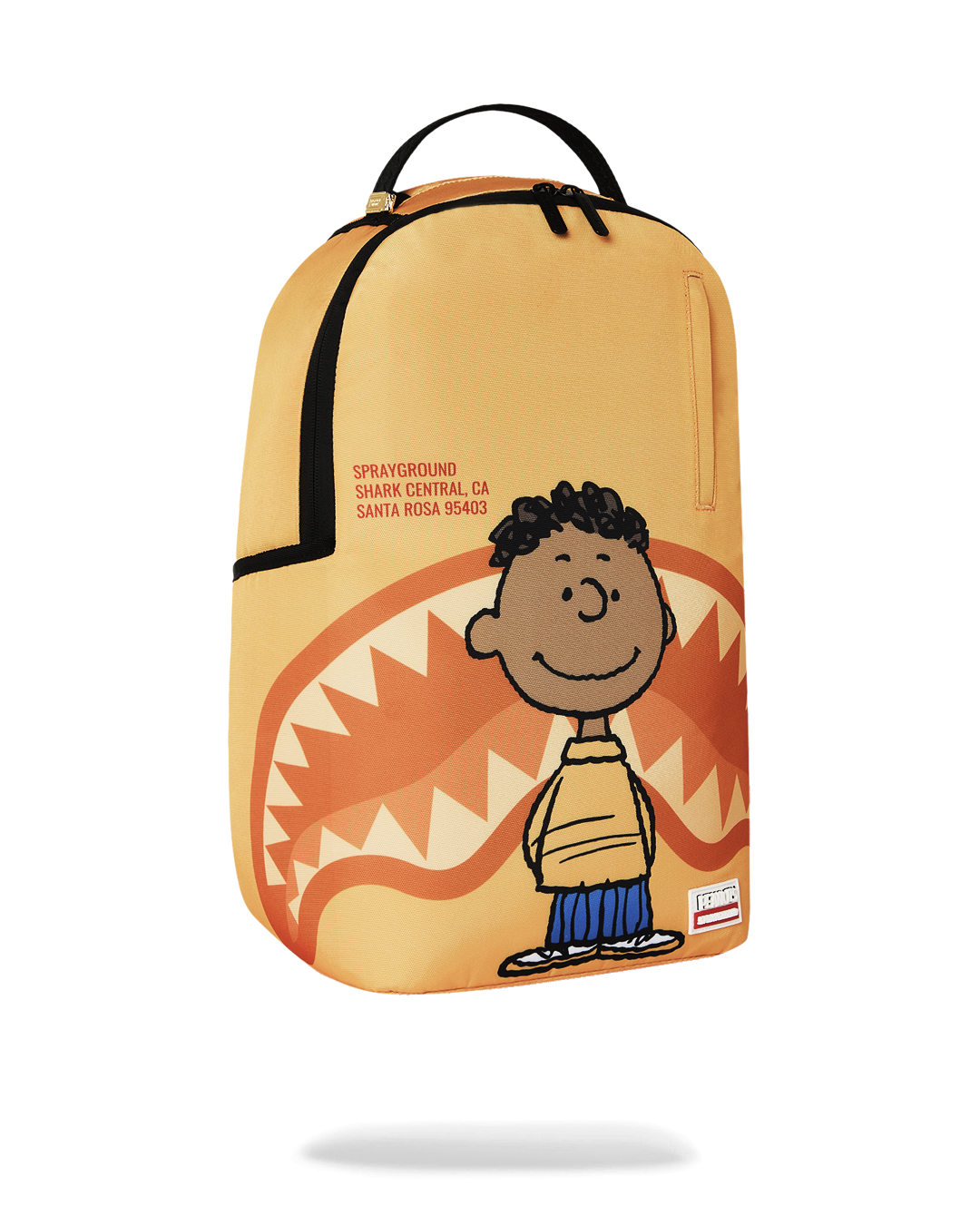 Sprayground Peanuts Franklin backpack, orange front panel with character graphic and zip