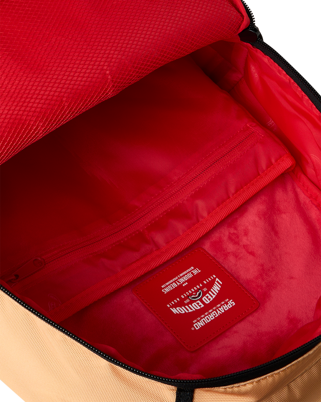 Sprayground Peanuts Franklin backpack interior, red lining with zipped pocket