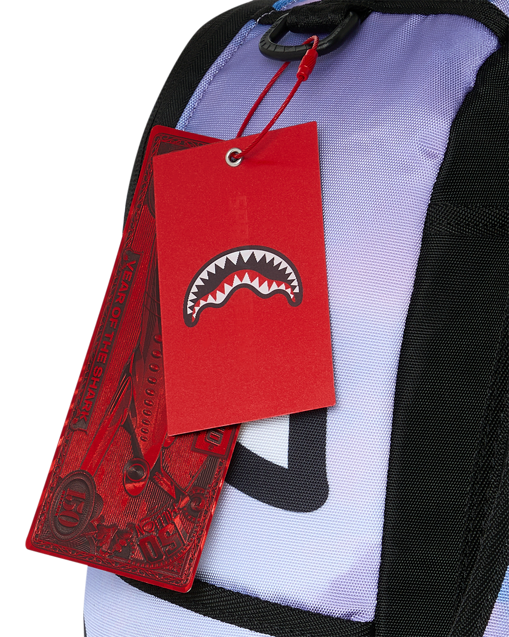 Sprayground Cloudbreaker backpack with red hang tag and logo graphic