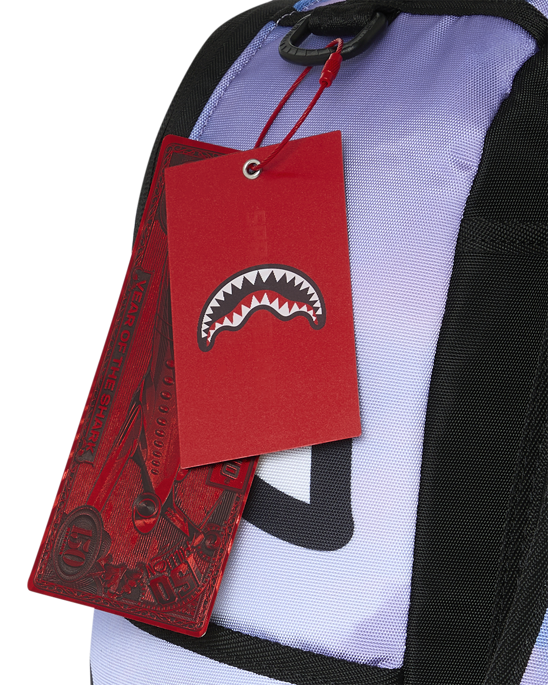 Sprayground Cloudbreaker backpack with red hang tag and logo graphic