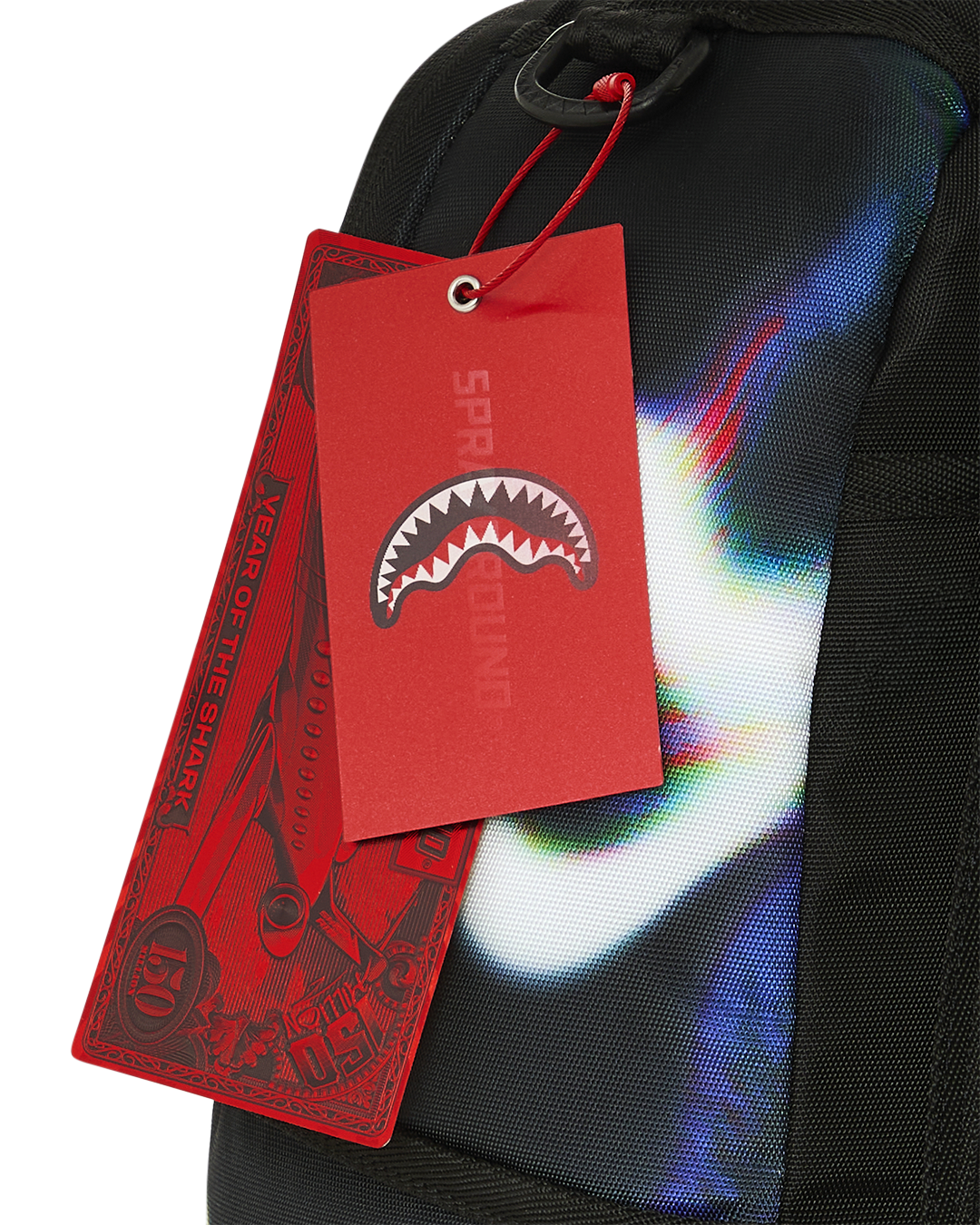 Sprayground Power Flex backpack with red hang tags attached to side