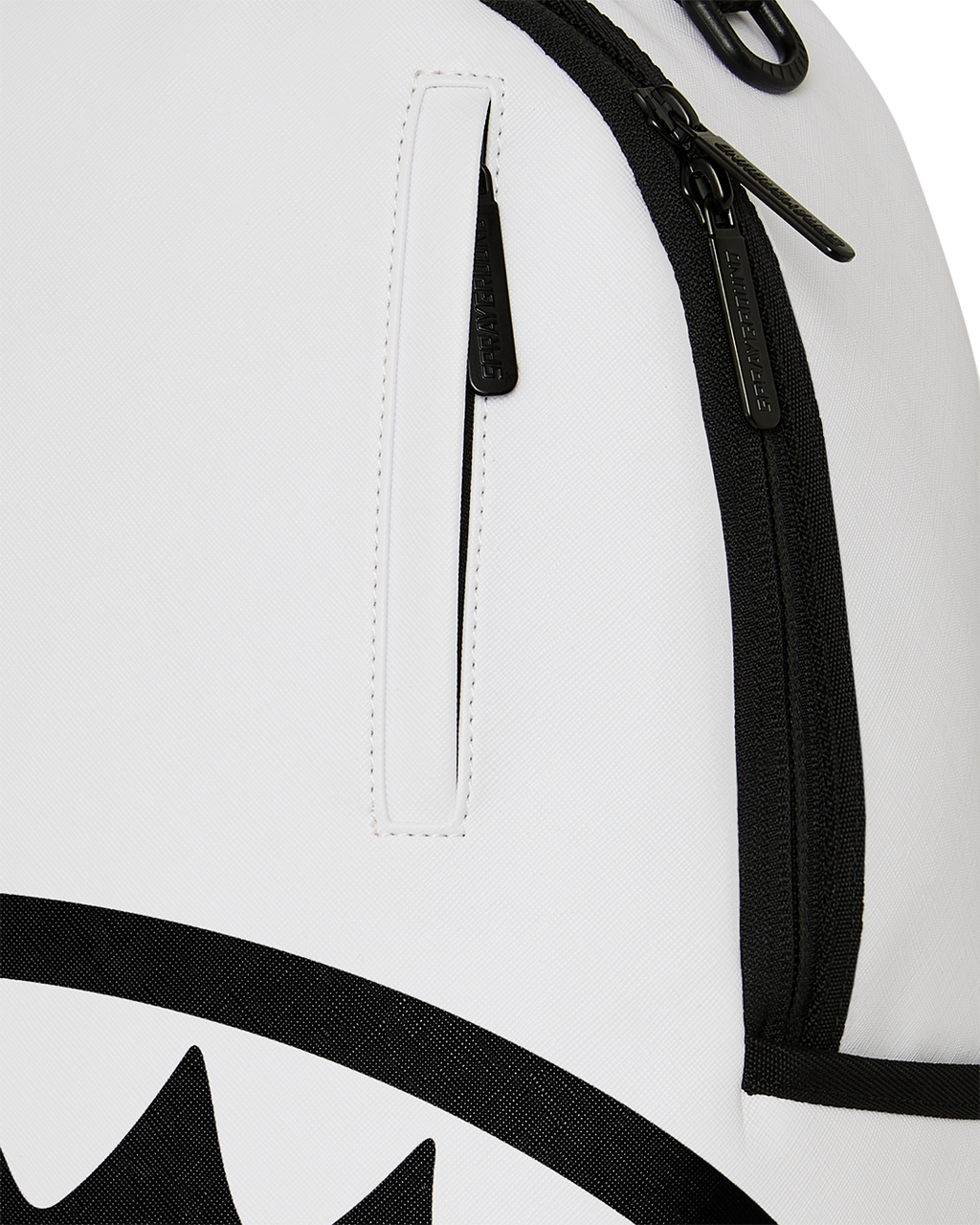 White backpack side view with black zipper and stitched black handle strap