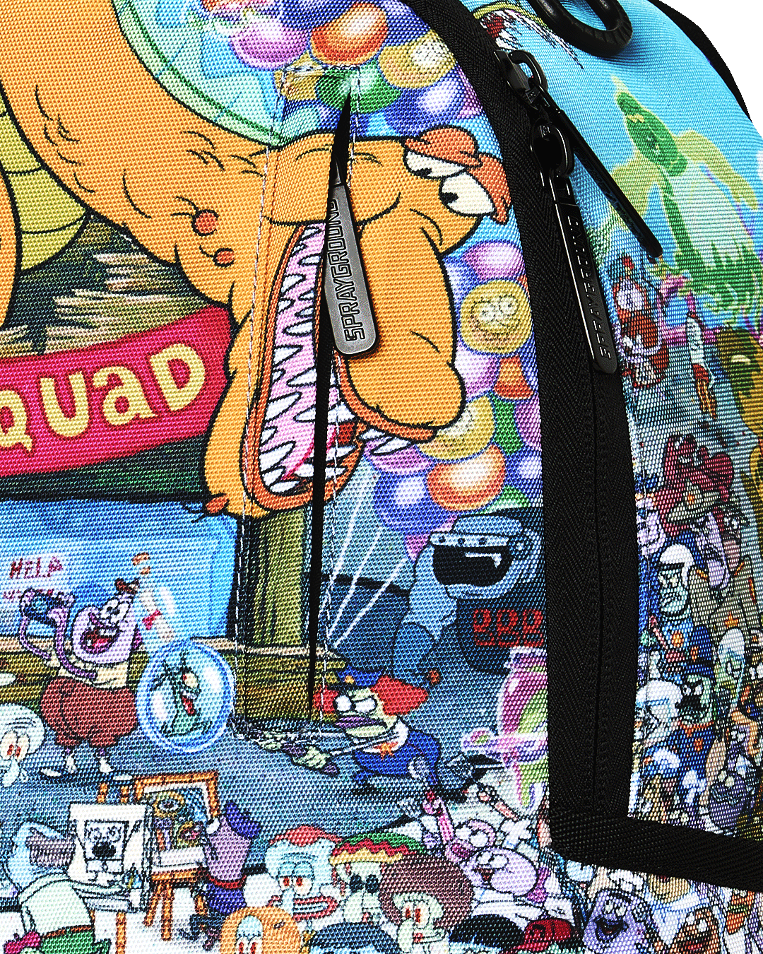 Close-up of SpongeBob backpack front fabric with label patch and black zipper trim