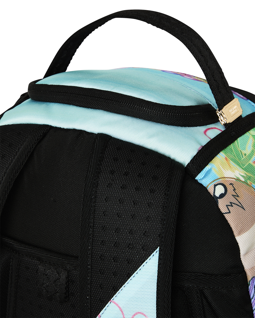 Close-up of padded shoulder straps and teal top edge on SpongeBob backpack