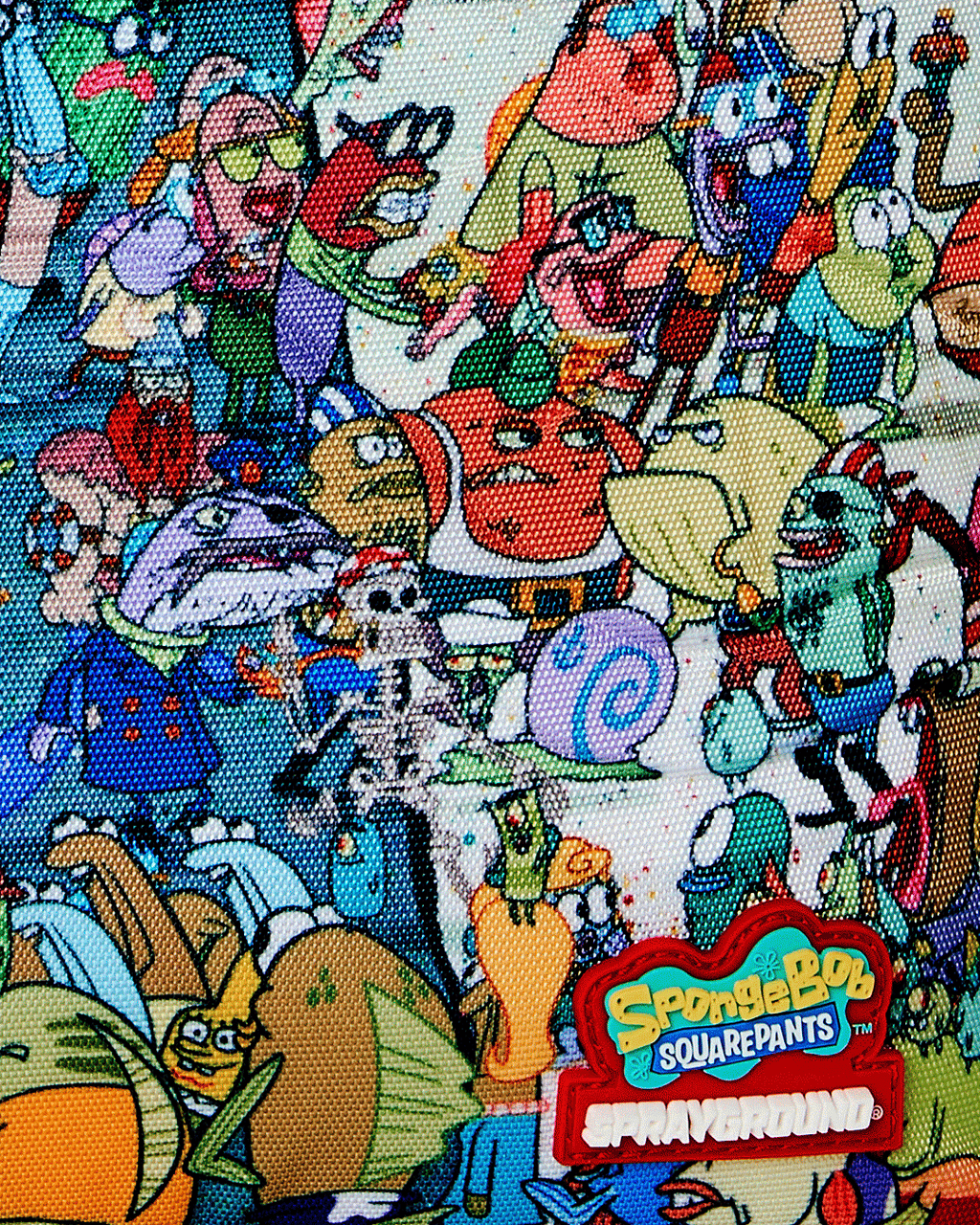 Close-up of SpongeBob backpack fabric print with colorful characters and ocean scene