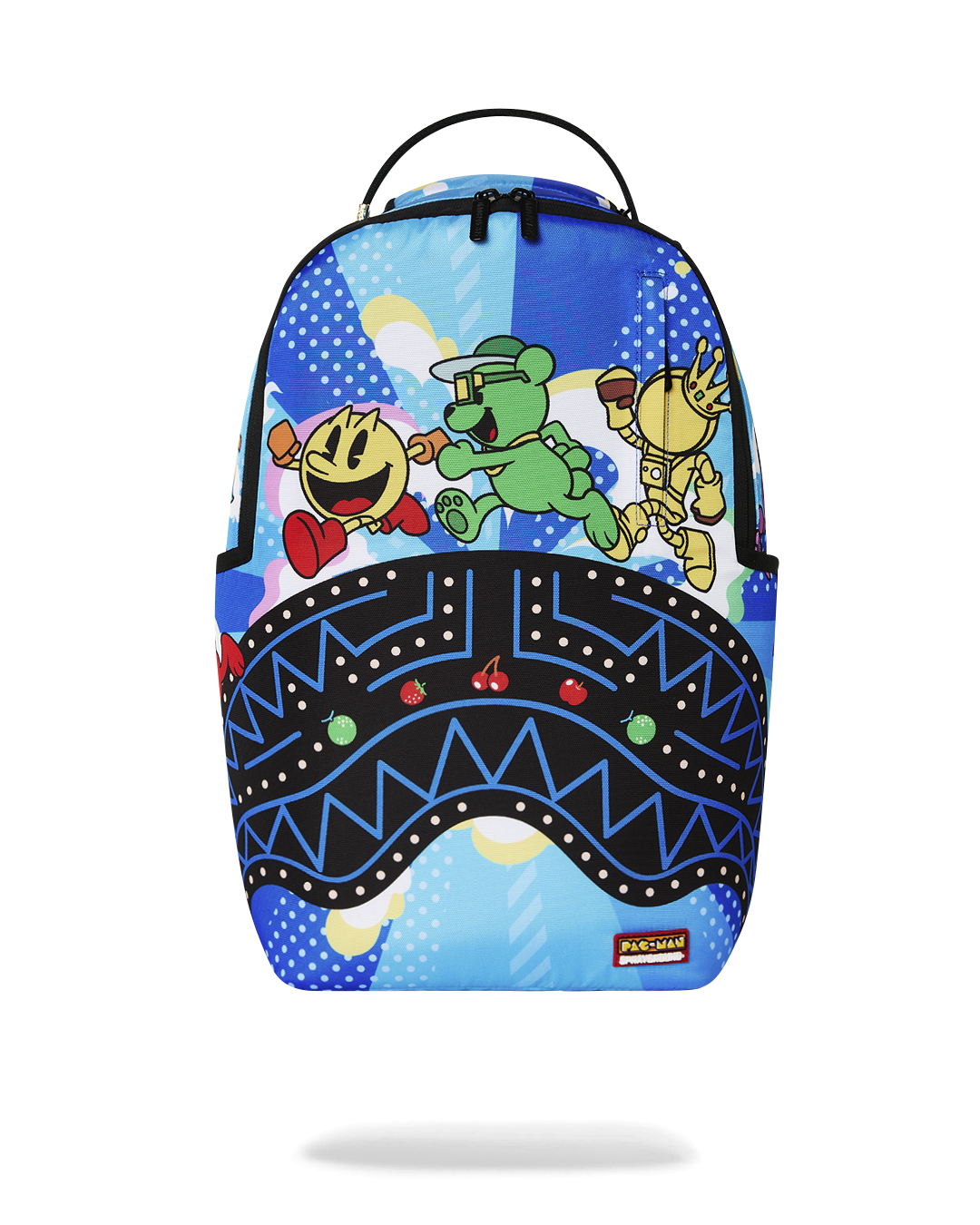 Blue cartoon arcade-themed backpack with Pac-Man character print and wavy geometric panel.