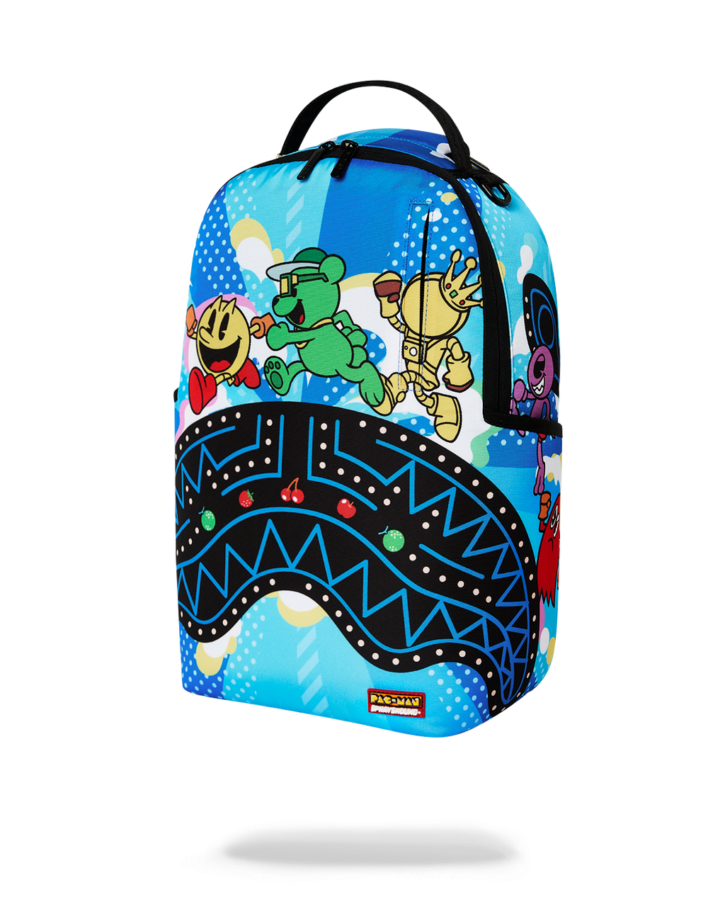 Blue backpack with Pac-Man characters, dotted pattern, and small yellow bottom logo patch.