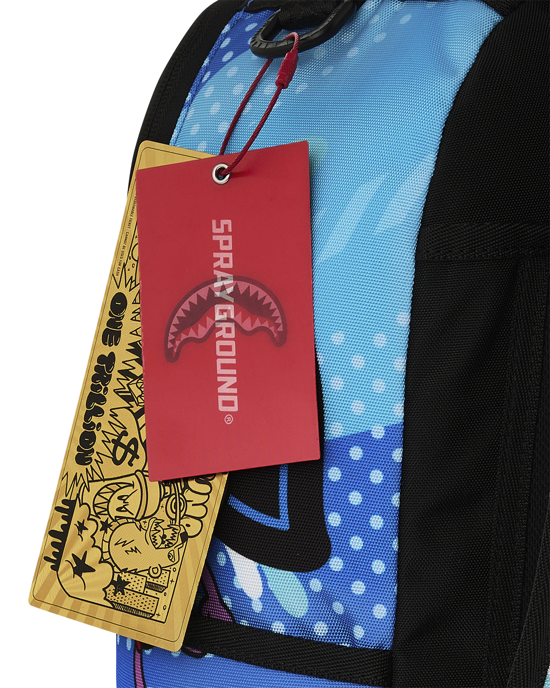Blue backpack with Pac-Man graphics and hanging retail tags in red and yellow.