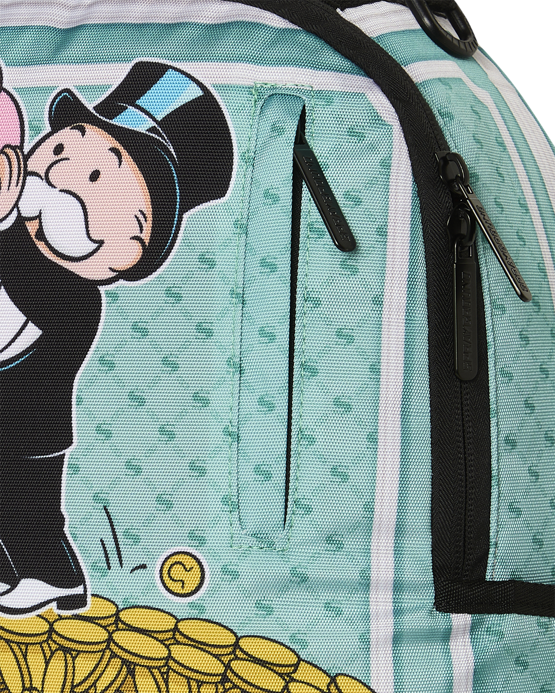 Close-up of teal backpack bag graphic with zipper on black-trim side panel