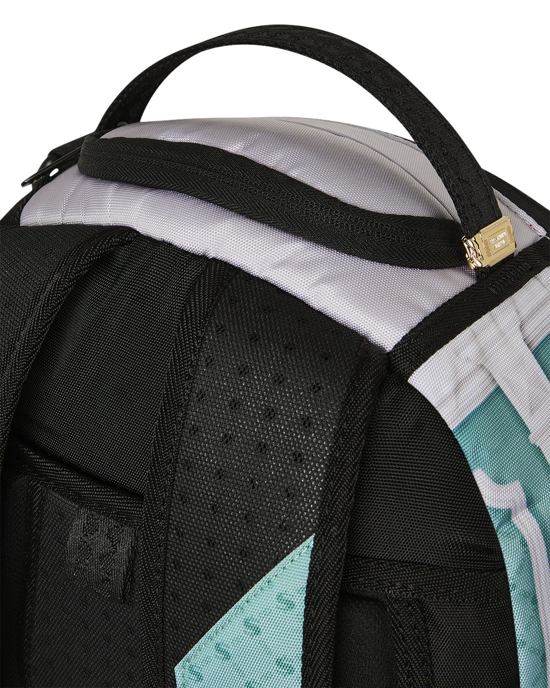 Backpack bag interior padding with black mesh panel and teal-and-white striped side