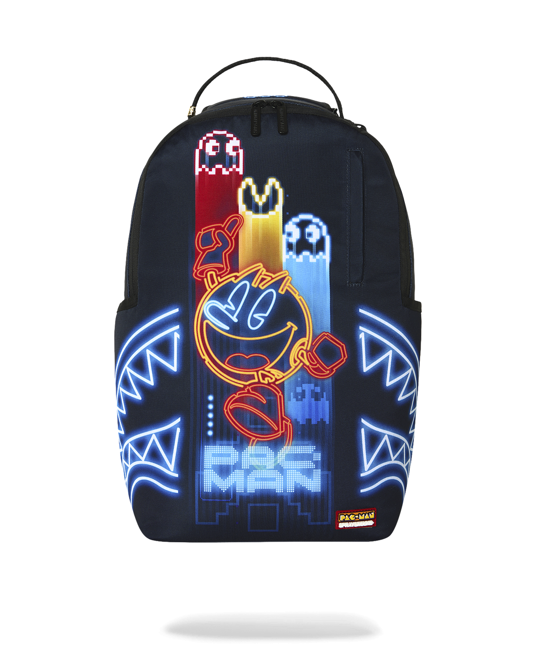 Sprayground Pac-Man Eat Em Up backpack with glowing arcade characters on navy fabric