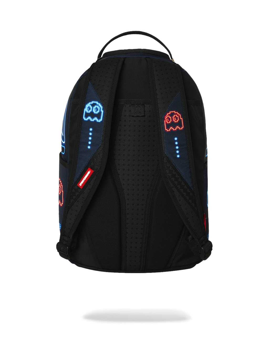 Pac-Man-themed backpack back panel with padded mesh, black straps, and small red icons
