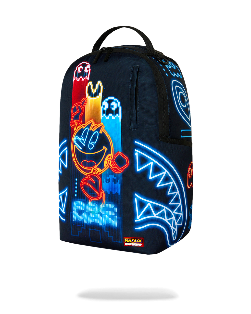 Pac-Man Eat Em Up backpack, 3/4 view with colorful arcade character and neon blue lines