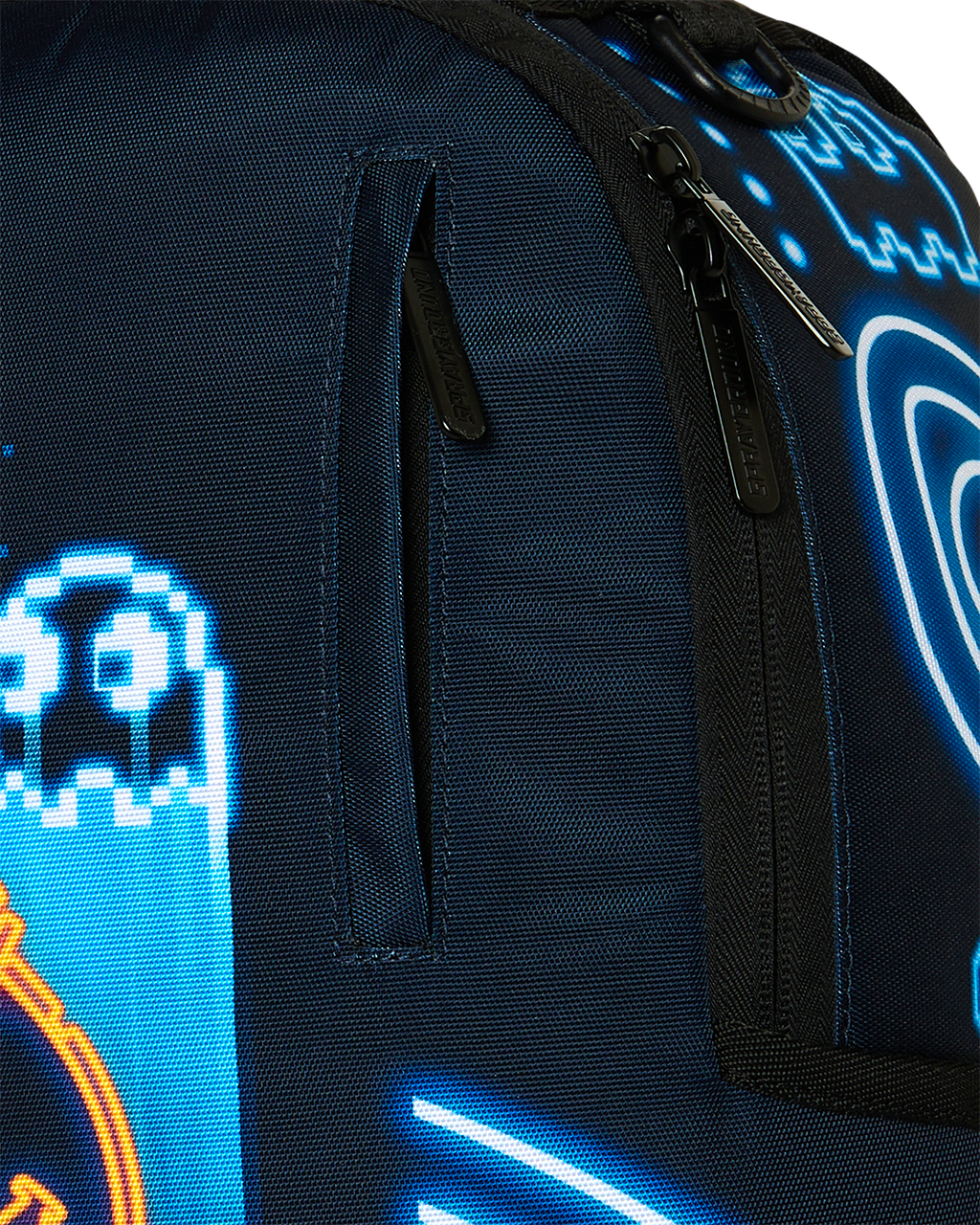 Backpack close-up of textured fabric and black zipper pull on glowing blue graphic