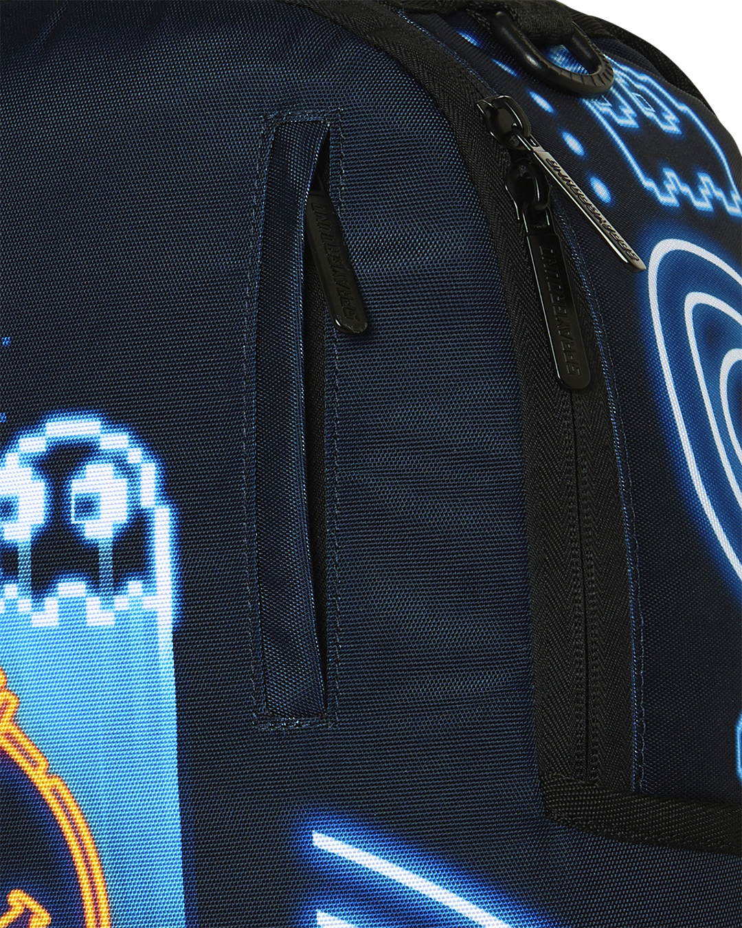 Backpack close-up of textured fabric and black zipper pull on glowing blue graphic