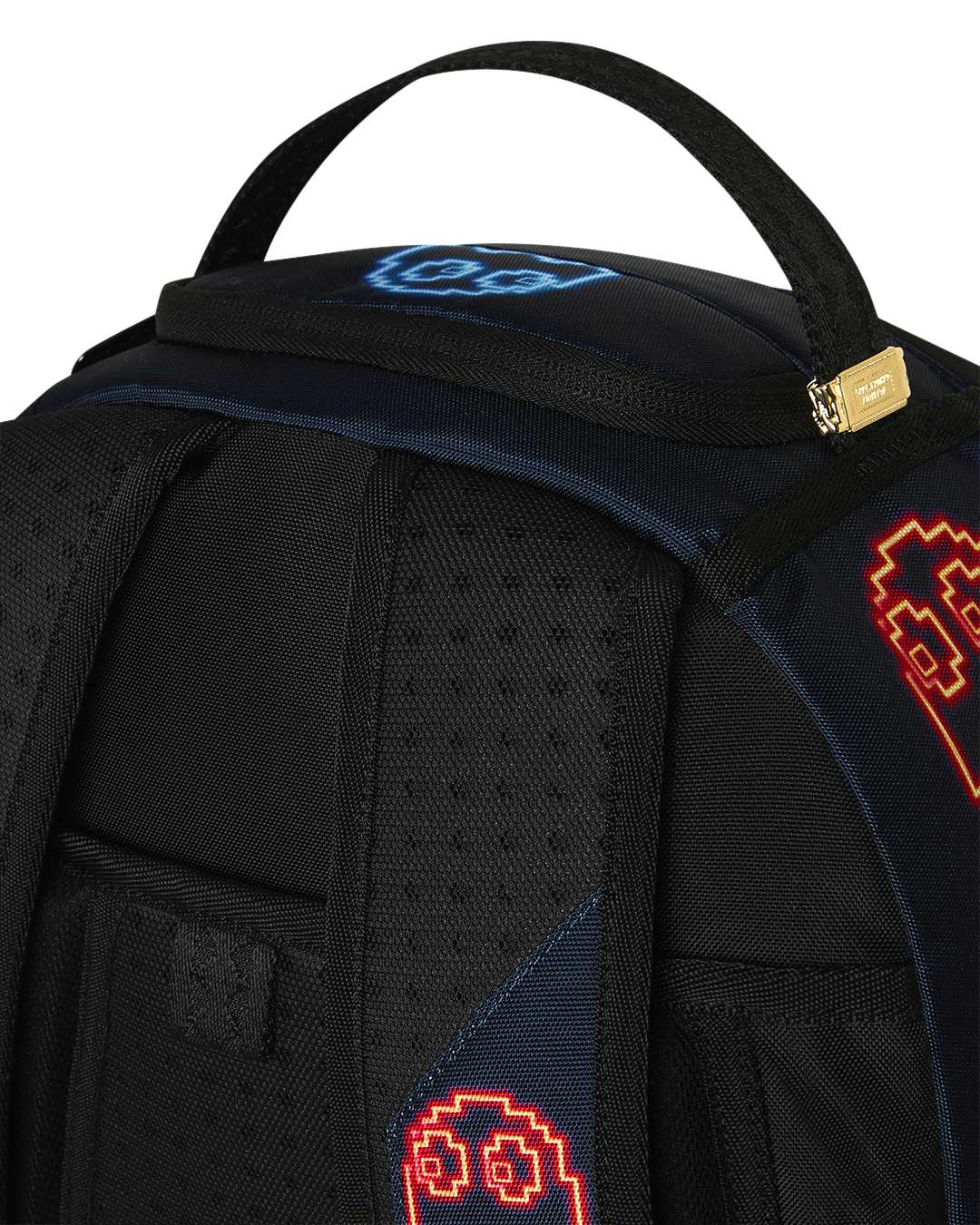 Pac-Man-themed backpack front top area with handle and red/blue pixel icons