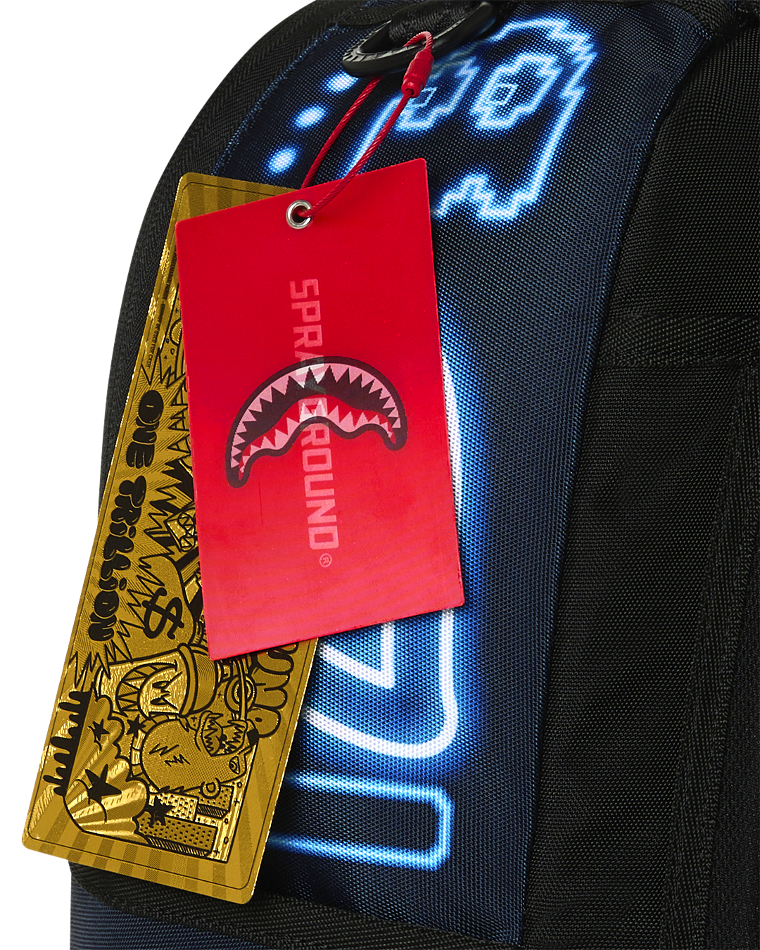 Sprayground backpack with hanging hangtags, blue neon game art on the front