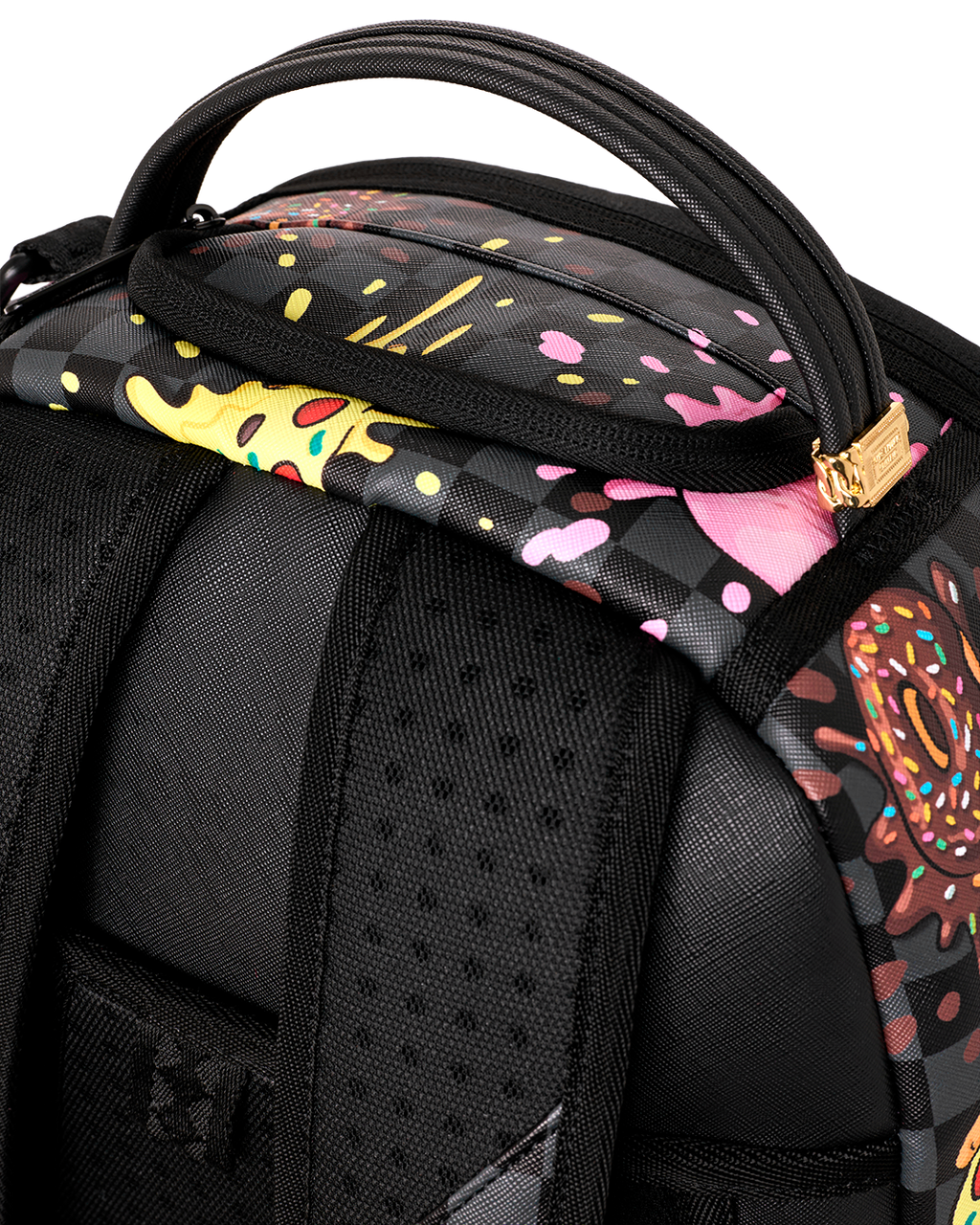 Black backpack close-up of patterned top handle strap and padded shoulder panel