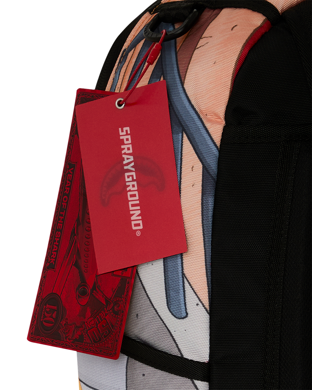 Kids backpack with red Sprayground hang tag hanging from side pocket