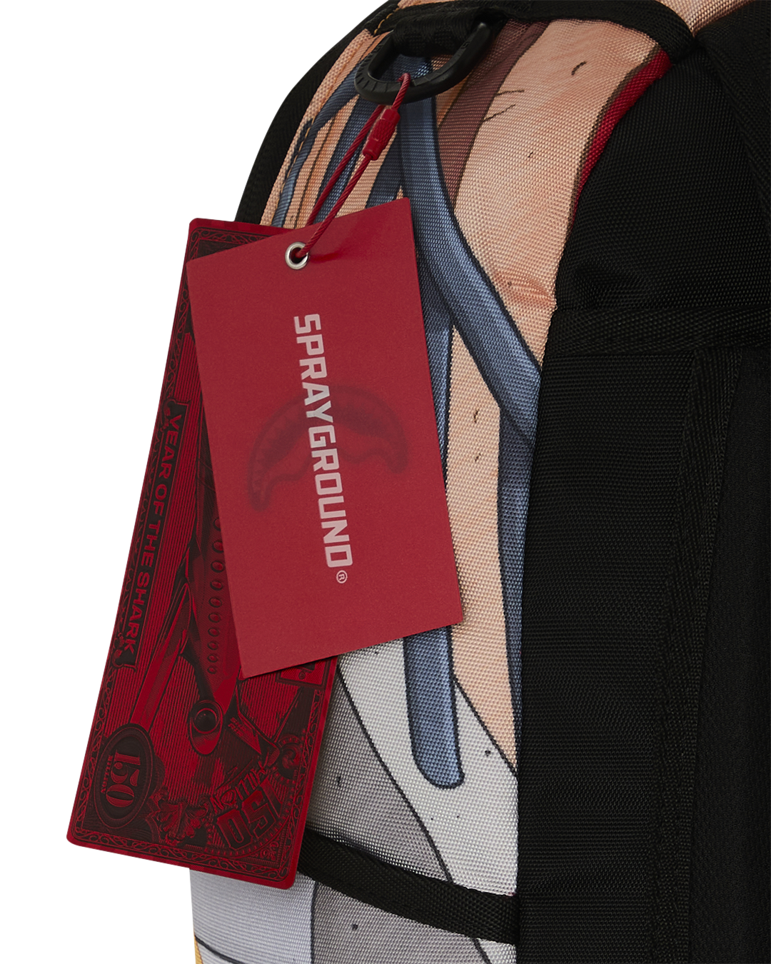 Kids backpack with red Sprayground hang tag hanging from side pocket