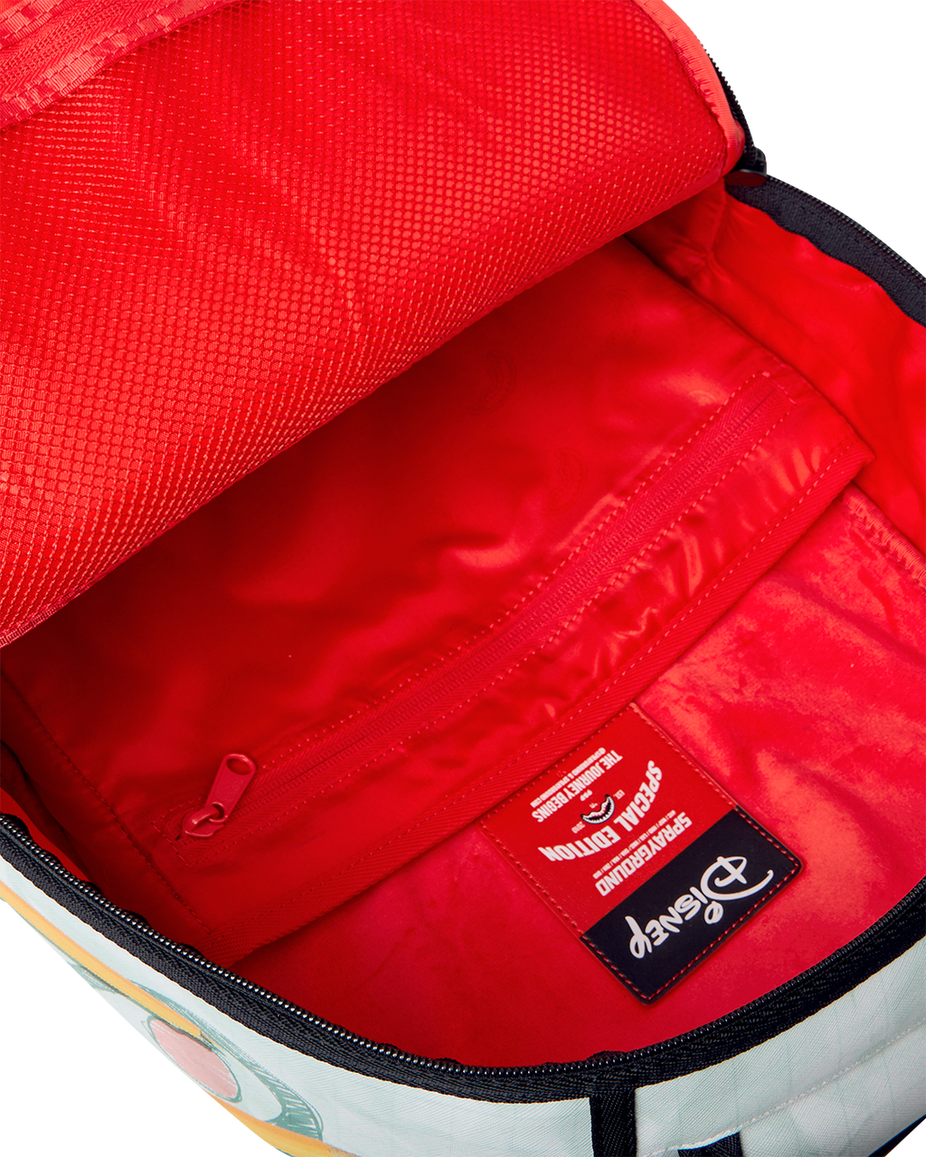 Interior lining of Mickey Mouse sketch mini backpack with zip pocket