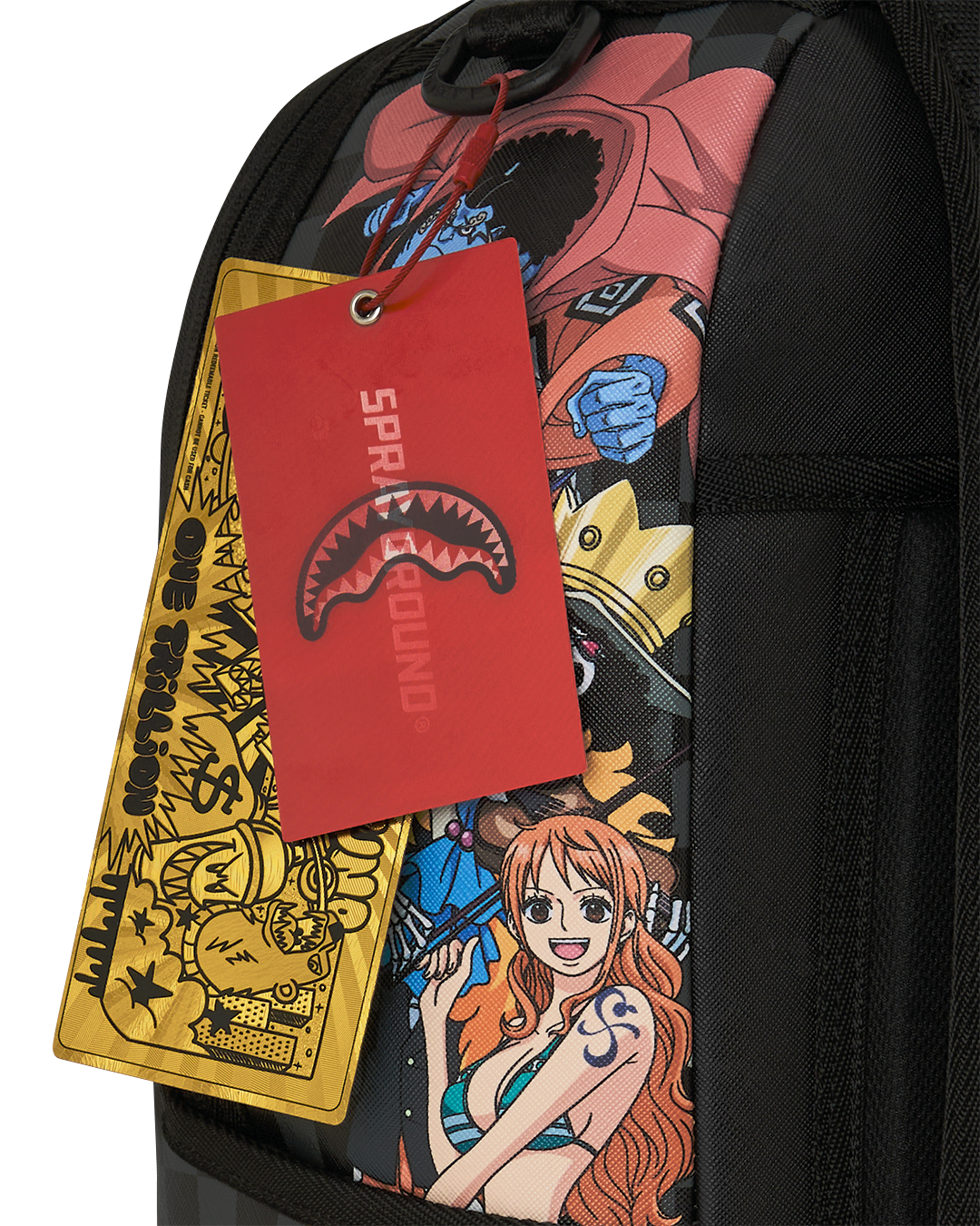 Sprayground backpack bag close-up with swing tags and anime character print panel