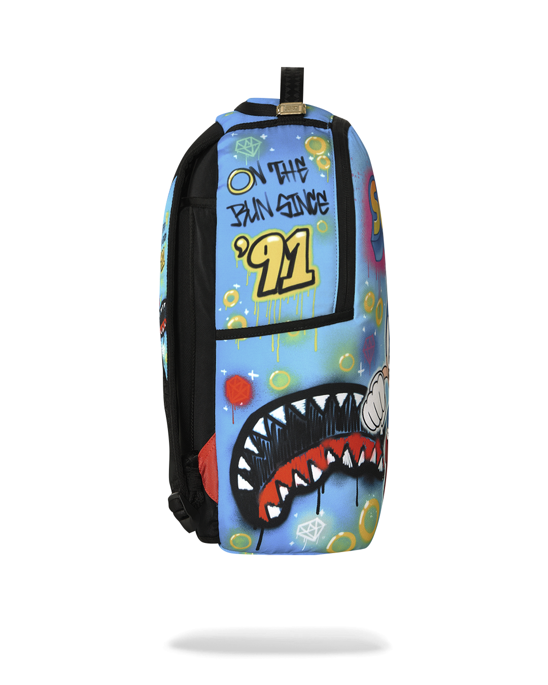 Blue and black Sonic-themed backpack back view with “01” patch and colorful print