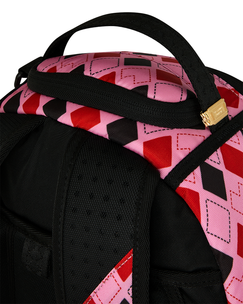 Harley Quinn backpack top and shoulder strap with black webbing and adjustable buckle.