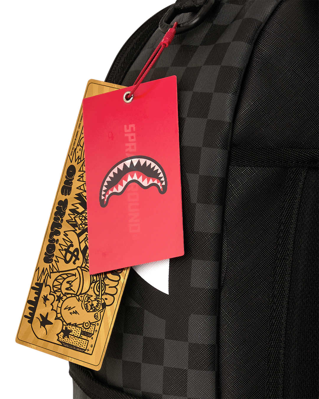 Black checkered backpack with red tag and zip front pocket