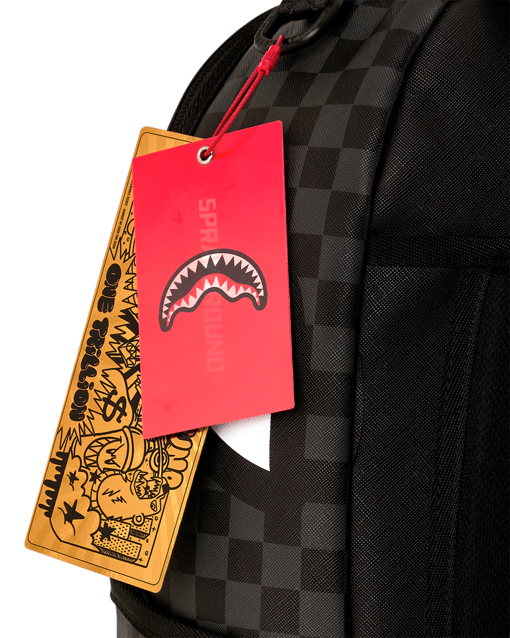 Black checkered mini backpack with hang tag and partial carrot stack fabric panel