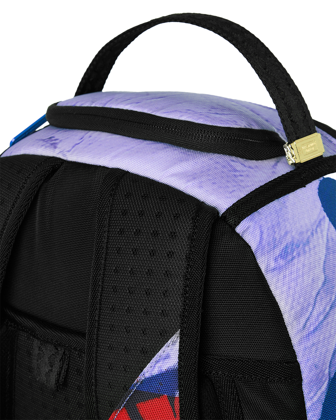 Kids backpack close-up of top handle and black padded shoulder strap