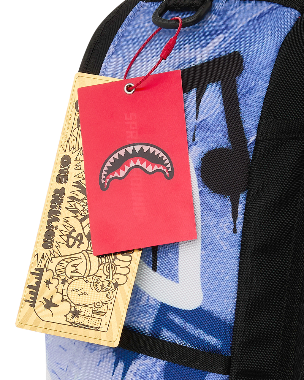 Kids backpack with red and tan hang tags attached near the shoulder strap