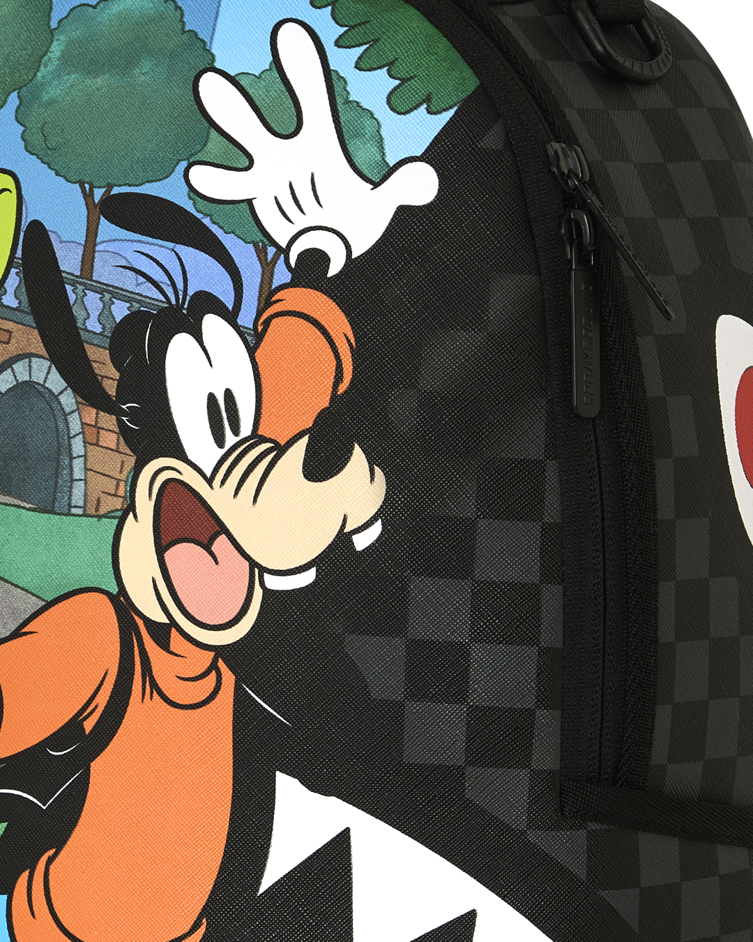 Close-up of black checker backpack with large Goofy print and side zipper pocket