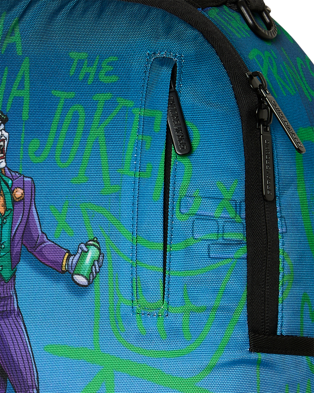 Close-up of Joker graphic mini backpack pocket with black zipper trim