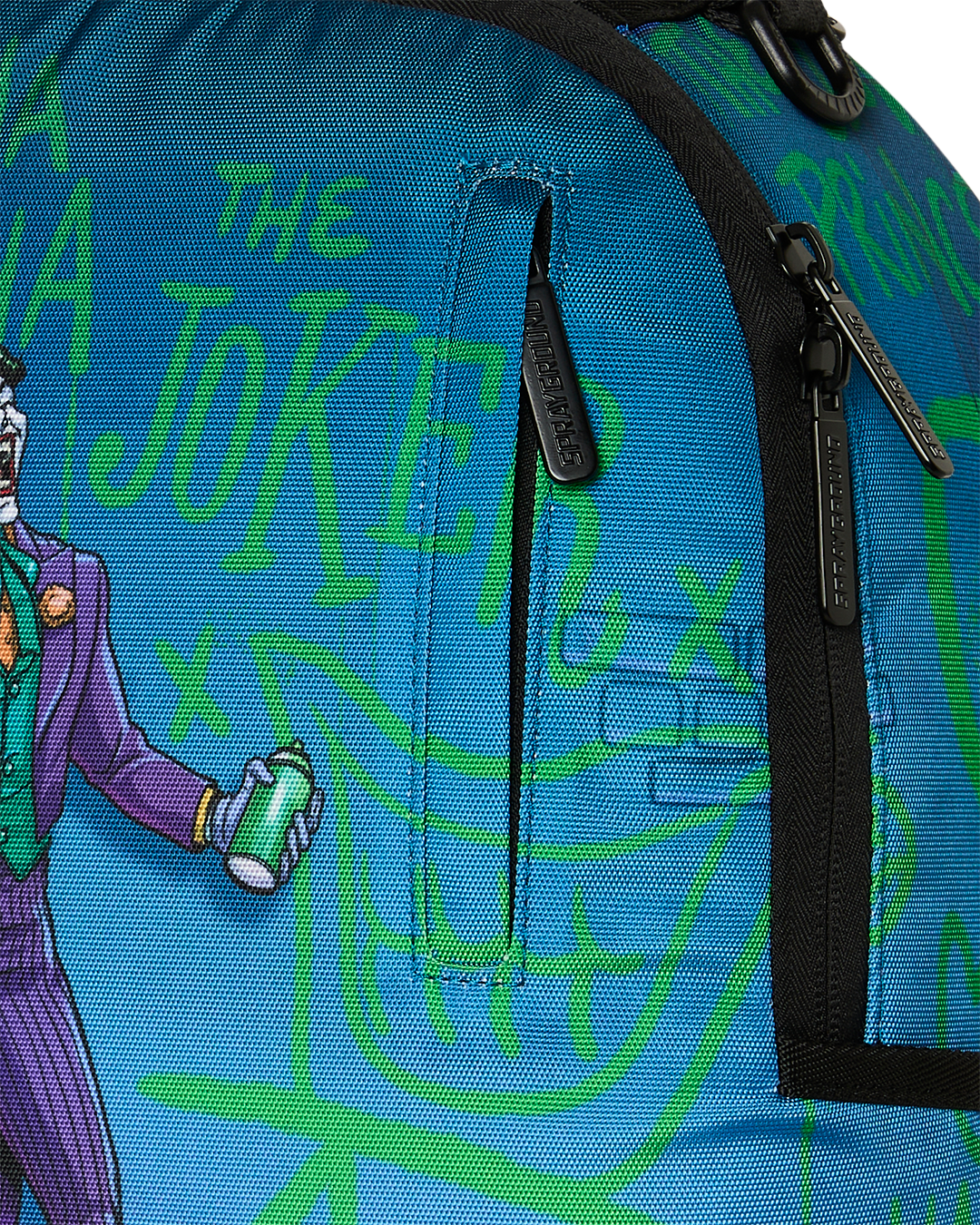 Close-up of Joker graphic mini backpack pocket with black zipper trim