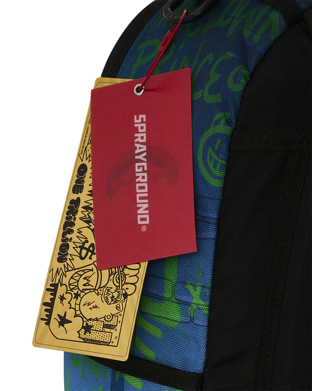 Mini backpack with hanging retail tags on blue Joker pattern fabric