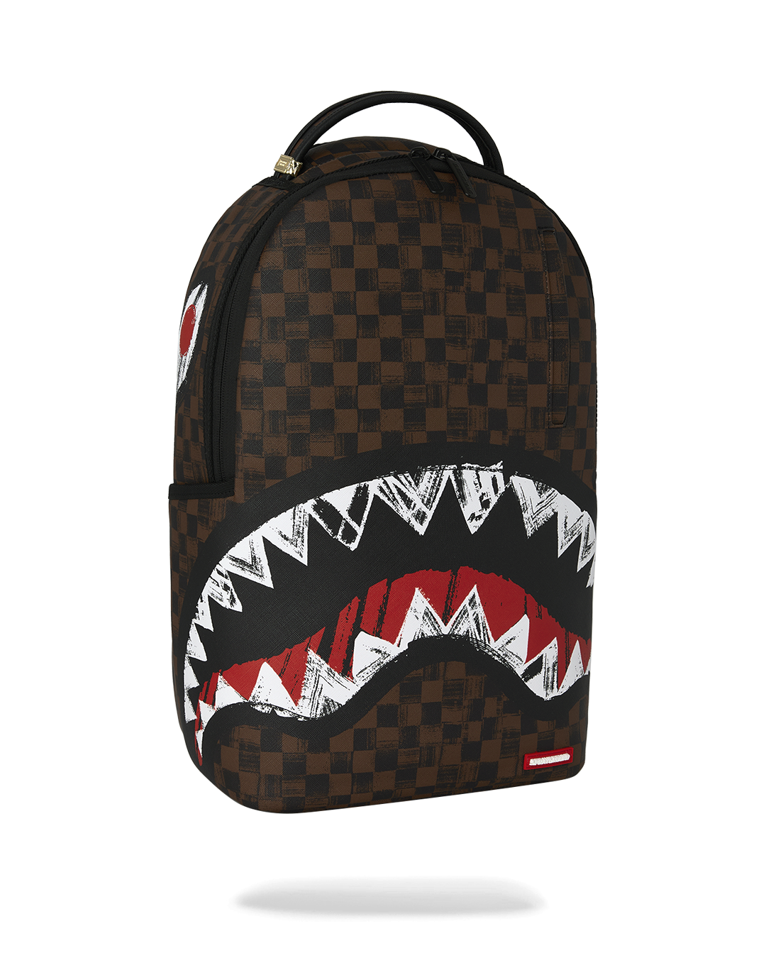 Sprayground backpack side view with brown checkered pattern and shark graphic